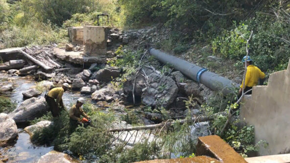 photo firefighters clear debris near water diversion structure in the White River National Forest in effort to protect water quality from contamination by the Grizzly Creek Fire in 2020 | source City of Glenwood Springs, Colorado via Water Education Colorado