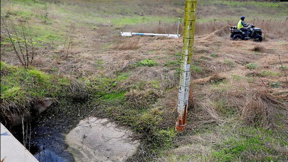 photo staff gauge measures water level | photo credit Santa Cruz Sentinel