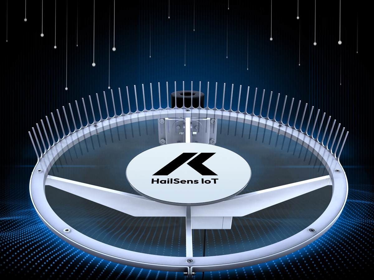 frontal view of HailSens IoT real-time hail sensor with backlighting and conceptual illustration of hailstones falling on the kinetic energy measurement panel